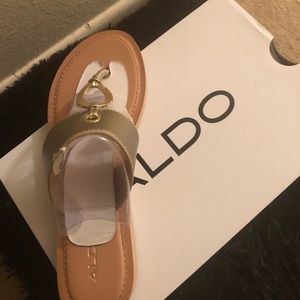 Aldo gold leather sandal.brand new